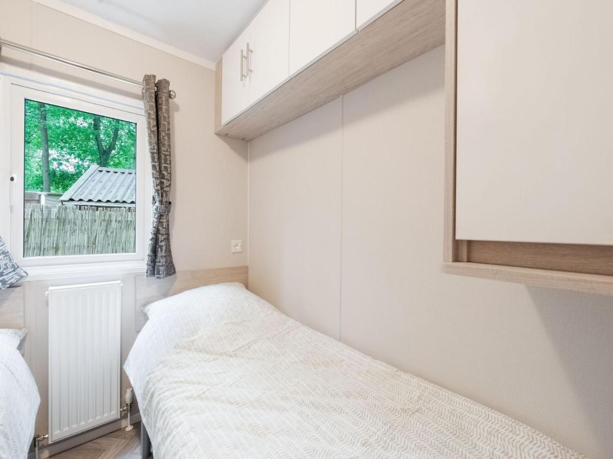 Beautiful In The Woods With A Shared Pool Holiday home *
